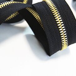 Молния металлическая рулонная тип 5, звено корн шлифованное, золото